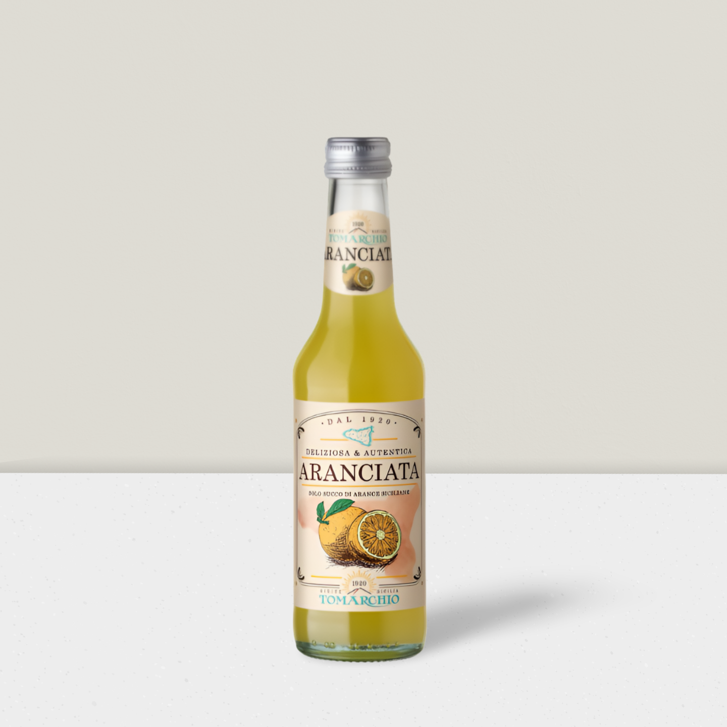 Bottle of Aranciata juice with a label featuring oranges on a white background