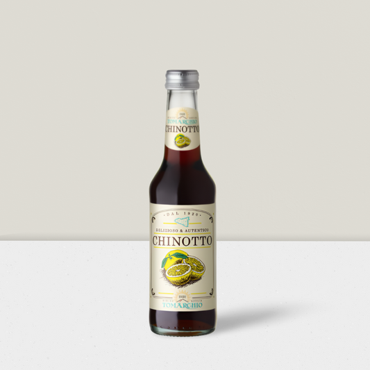 Bottle of Chinotto on a white background