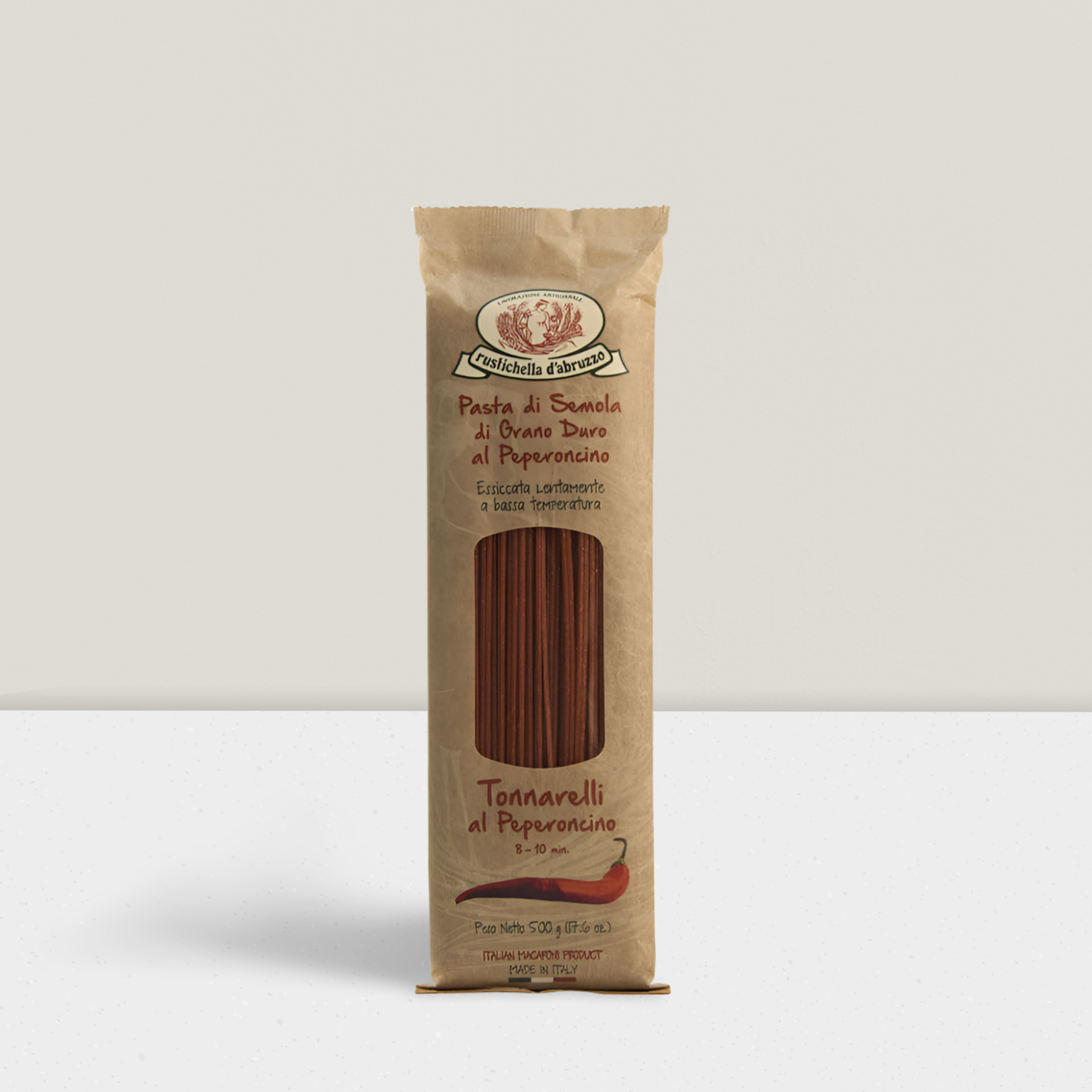 Package of Tonnarelli al Peperoncino pasta on a white background
