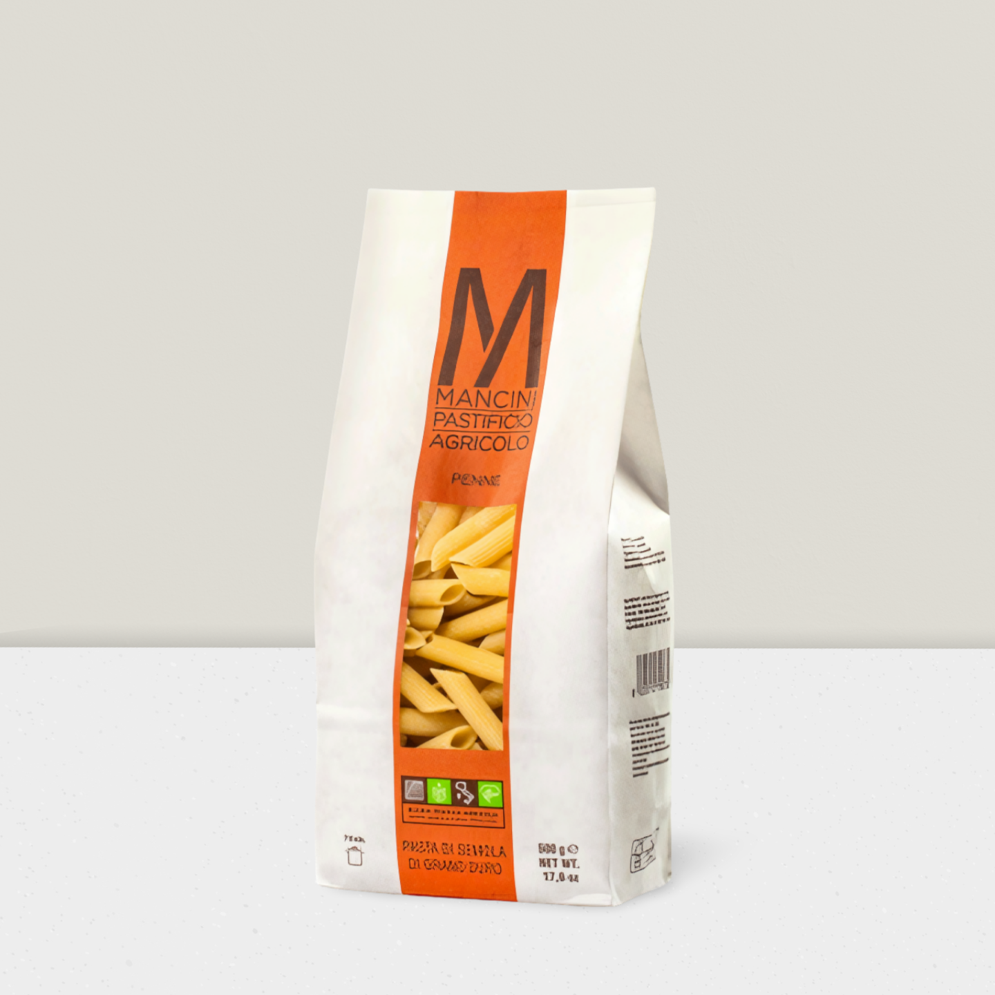 Bag of Mancini pasta with an orange label on a white background
