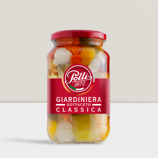 Mixture of classic pickled vegetables Italian style in a glass jar