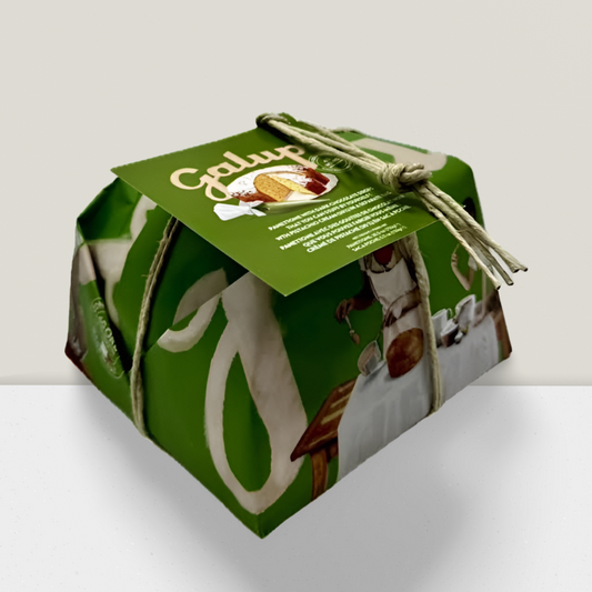 Green packaging box with a label, tied with string on a light gray background