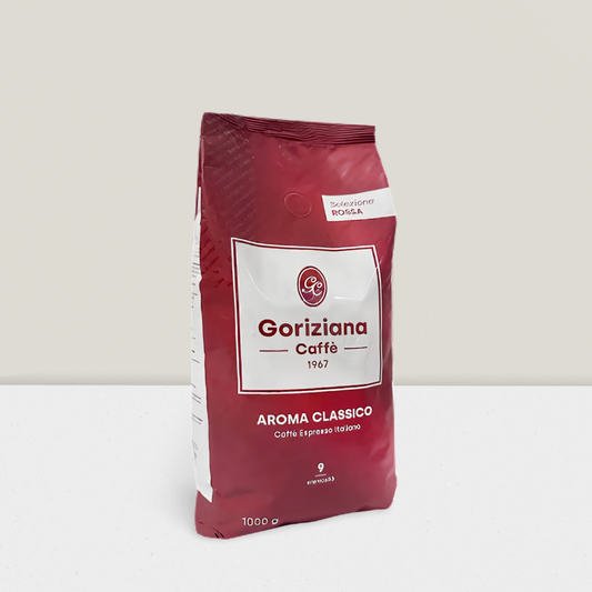 Red coffee bag with 'Goriziana Caffè' branding on a white background
