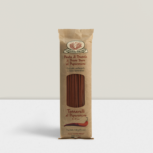 Package of Tonnarelli al Peperoncino pasta on a white background
