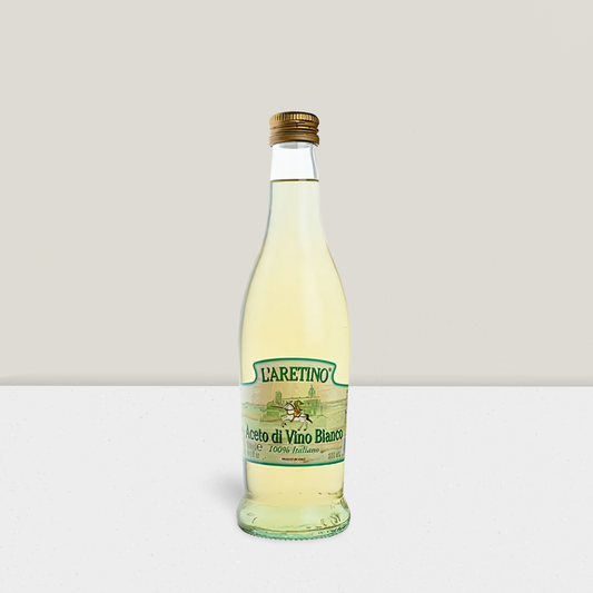 Bottle of L'aretino white wine on a light gray background