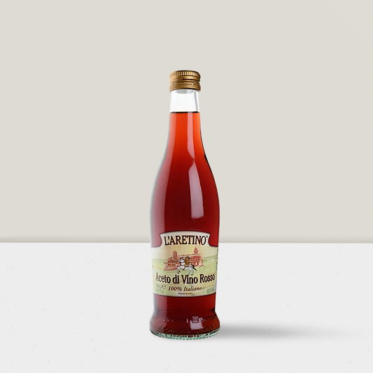 Bottle of L'Aretino Aceto di Vino Rosso on a white background