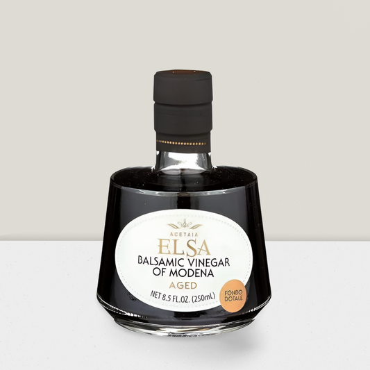 bottle of Elsa balsamic aged vinegar on  a grey background