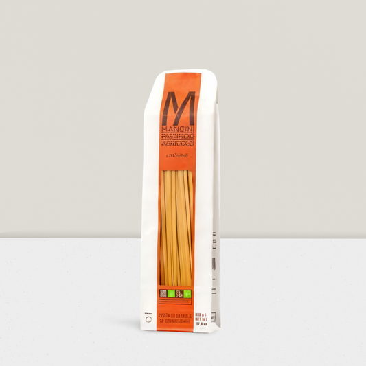 Box of Mancini pasta on a white background