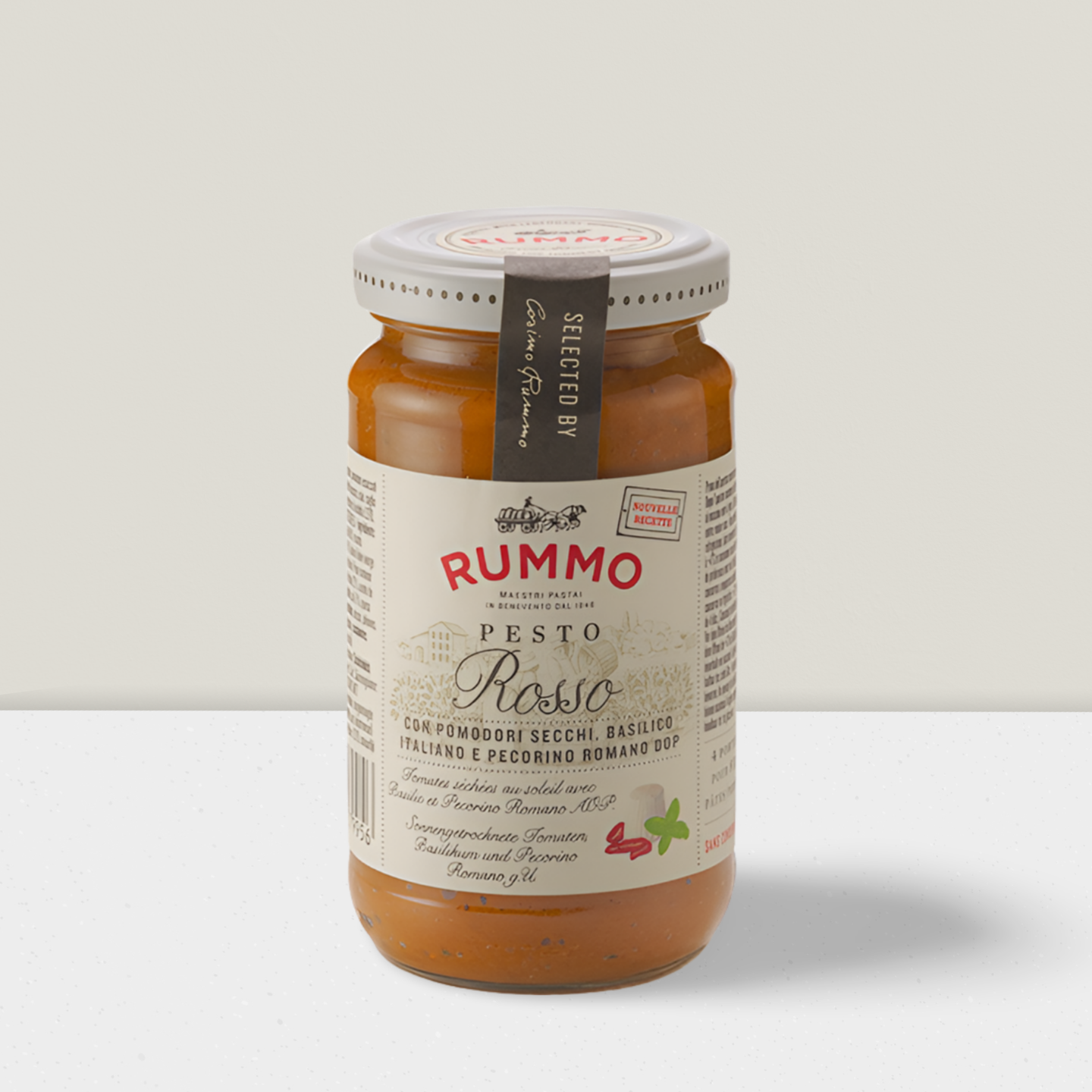 Jar of Rummo Pesto Rosso on a light gray background