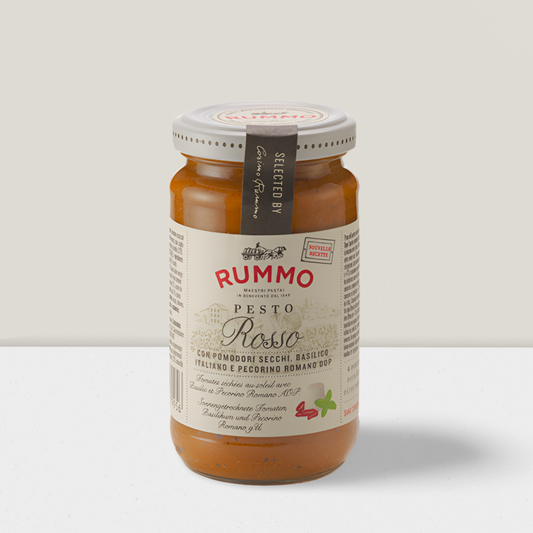 Jar of Rummo Pesto Rosso on a light gray background