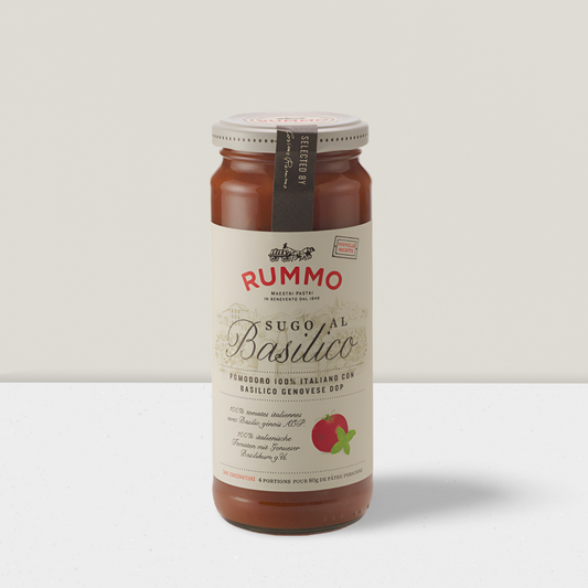 Jar of Rummo basil sauce on a white background